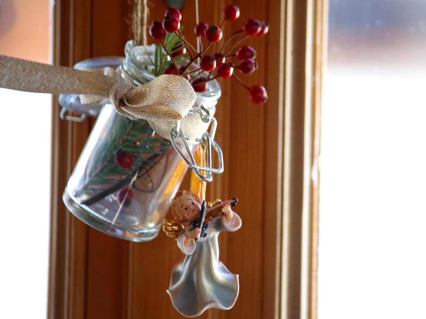 Festive Hanging Jar Decoration with Pine, Berries, and Angel Ornament Festive Hanging Jar Decoration with Pine, Berries, and Angel Ornament — Christmas Window Wreaths