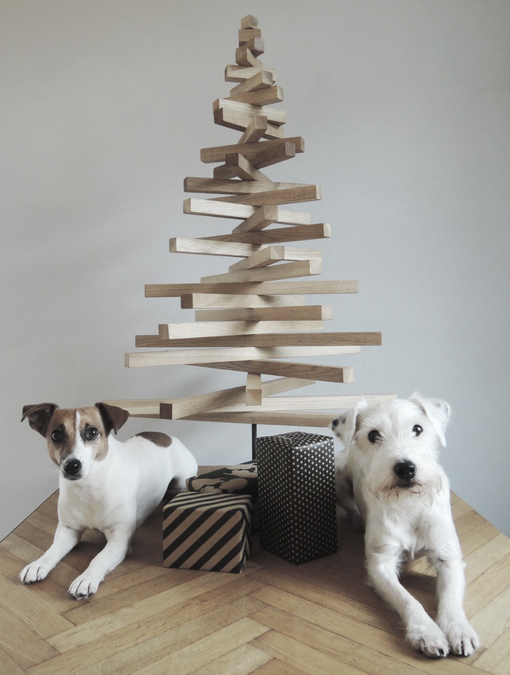 Stacked Wooden Christmas Tree with Dog Companions — Minimalist Christmas Tree