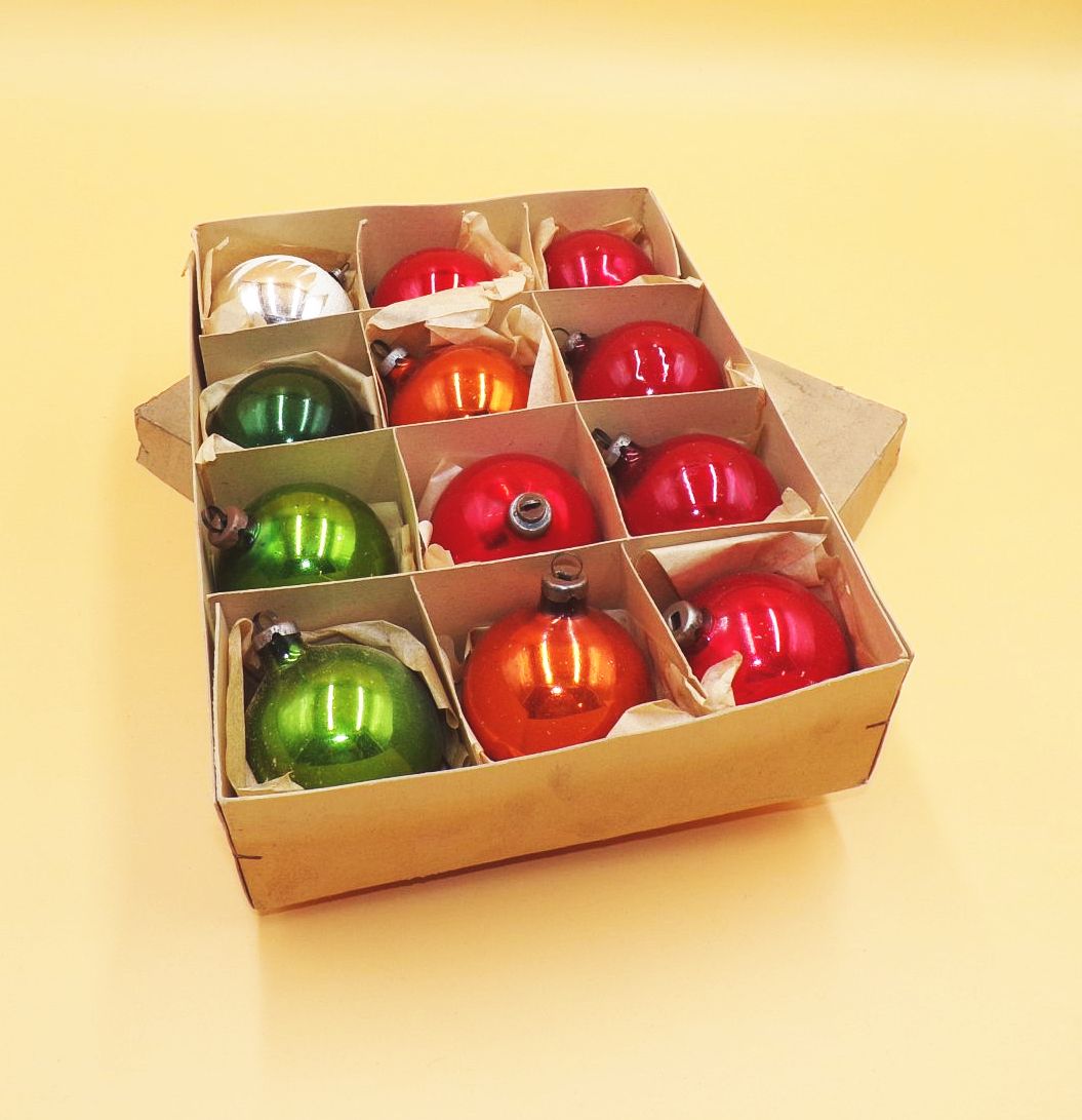 Vintage Packaging with Red, Green, and Orange Ornaments Vintage Packaging with Red, Green, and Orange Ornaments — Vintage Christmas Ornaments