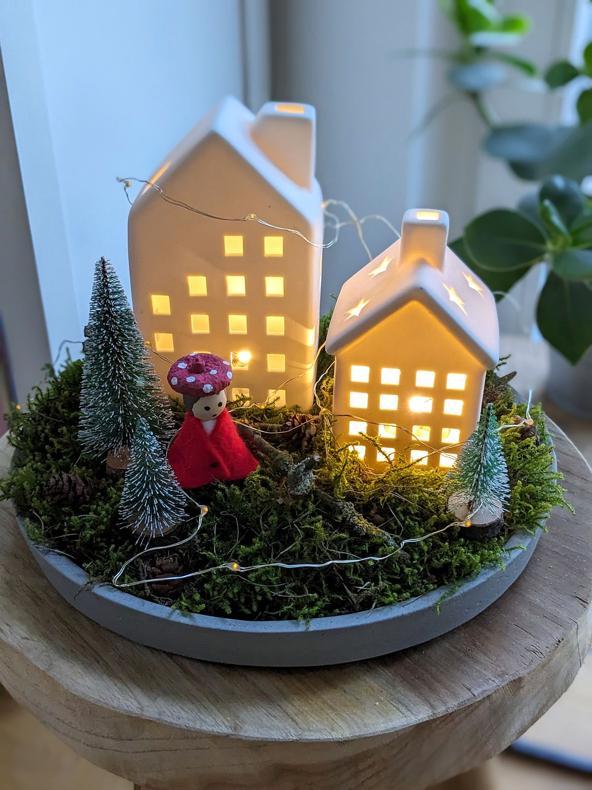 Whimsical Tabletop Village with Glowing Ceramic Houses Whimsical Tabletop Village with Glowing Ceramic Houses — Christmas Light Display Ideas