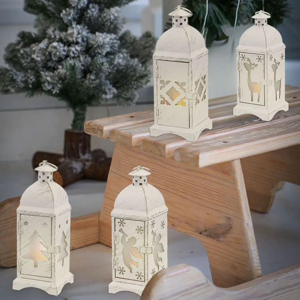 Use White Lanterns with Christmas Cutouts on a Wooden Sled — Christmas Porch Lanterns