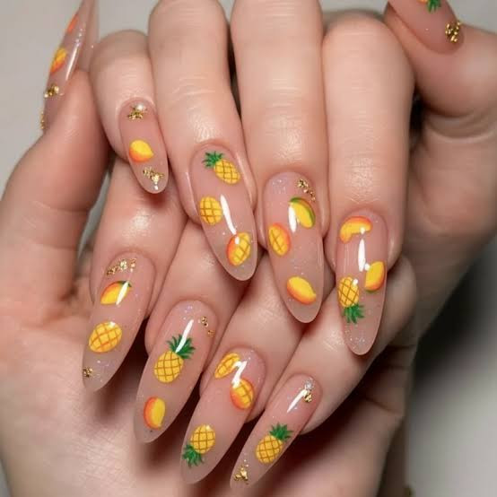 Long Stiletto Nails With Tropical Fruit And Gold Flakes Long Stiletto Nails With Tropical Fruit And Gold Flakes — pineapple nails ideas 2027