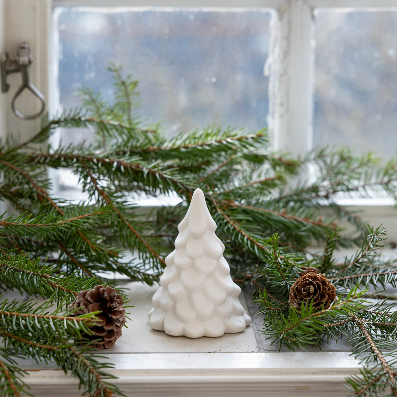 White Ceramic Tree on Windowsill with Pine — Tabletop Christmas Tree Decor