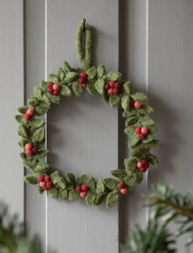 Handmade Felt Wreath with Berries on a Grey Door Handmade Felt Wreath with Berries on a Grey Door — Christmas Window Wreaths