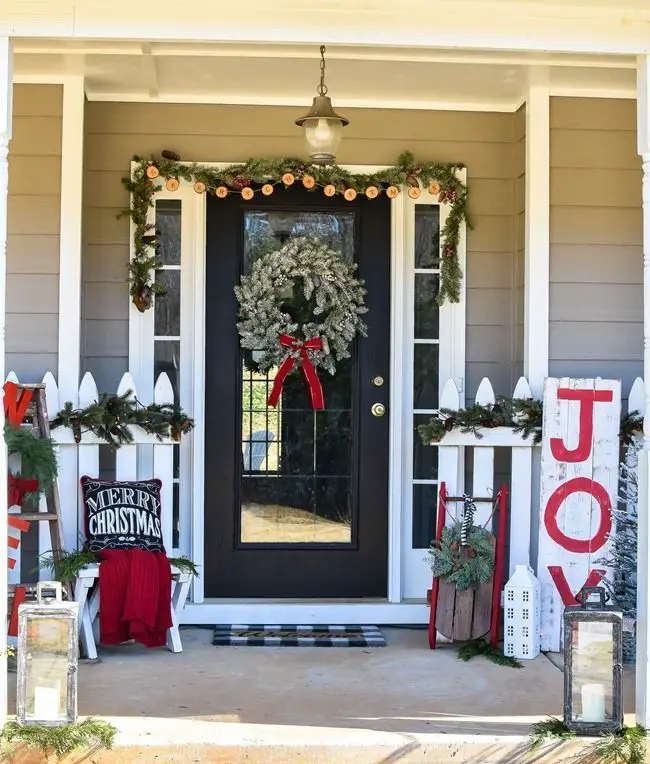 Farmhouse Front Porch with Prominent 'JOY' Sign Farmhouse Front Porch with Prominent 'JOY' Sign — Farmhouse Christmas Porch
