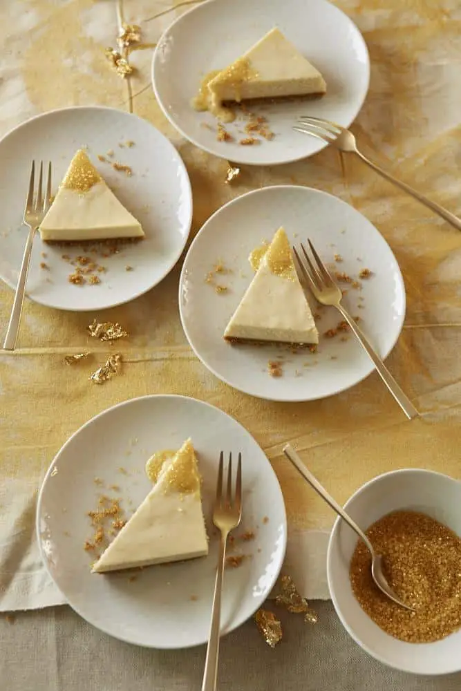Golden Cheesecake Slices with Edible Gold Leaf — Christmas Dessert Table