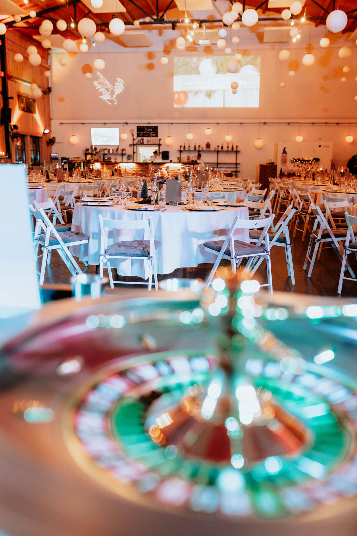 Event Hall Backdrop with Rows of Festive Tables — Christmas Party Backdrop