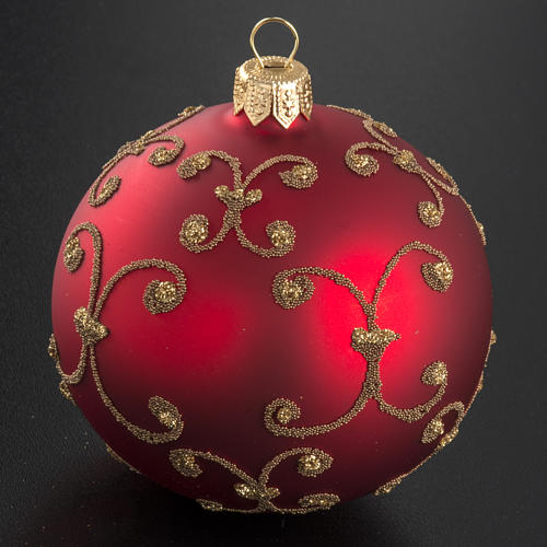 Red Glass Ornament with Delicate Gold Filigree on Neutral Background Red Glass Ornament with Delicate Gold Filigree on Neutral Background — Red and Gold Christmas Tree