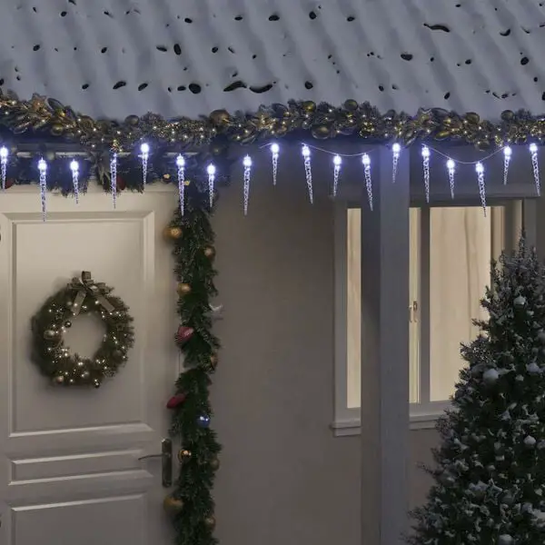 Illuminated Roofline Above a Decorated Doorway Illuminated Roofline Above a Decorated Doorway — Icicle Christmas Lights