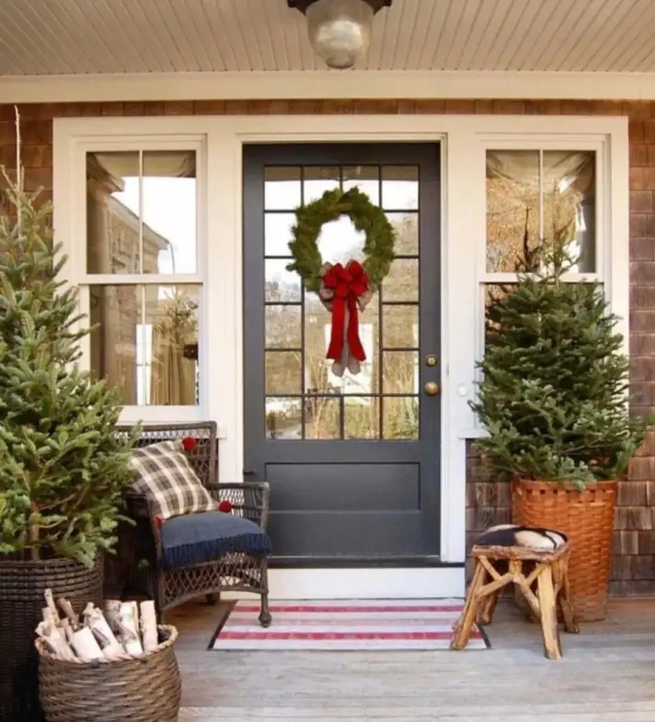 Classic Farmhouse Door with Large Wreath and Potted Trees Classic Farmhouse Door with Large Wreath and Potted Trees — Farmhouse Christmas Porch