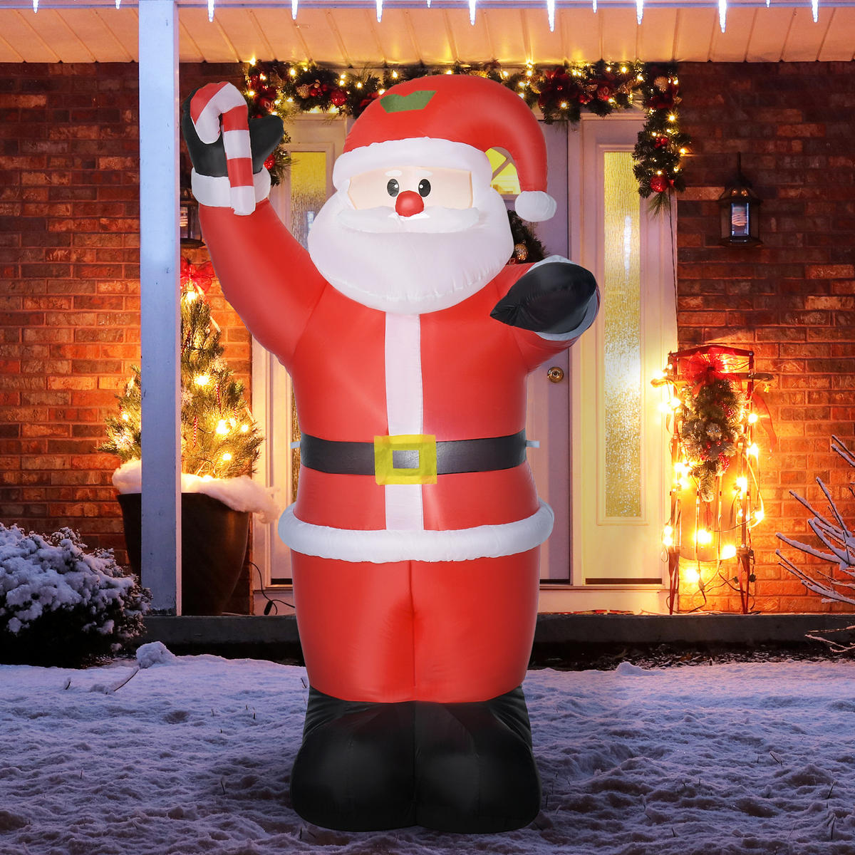 Inflatable Santa Claus on Snow-Covered Porch — Christmas Yard Decor