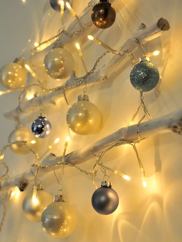 Rustic White-Painted Branch Tree with Ornaments and Lights Detail — Wall Christmas Tree