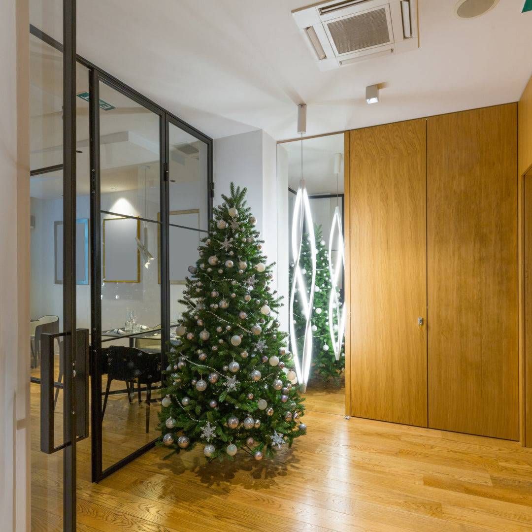 Modern Hallway Christmas Tree with Silver Ornaments — Christmas Tree Trends 2026