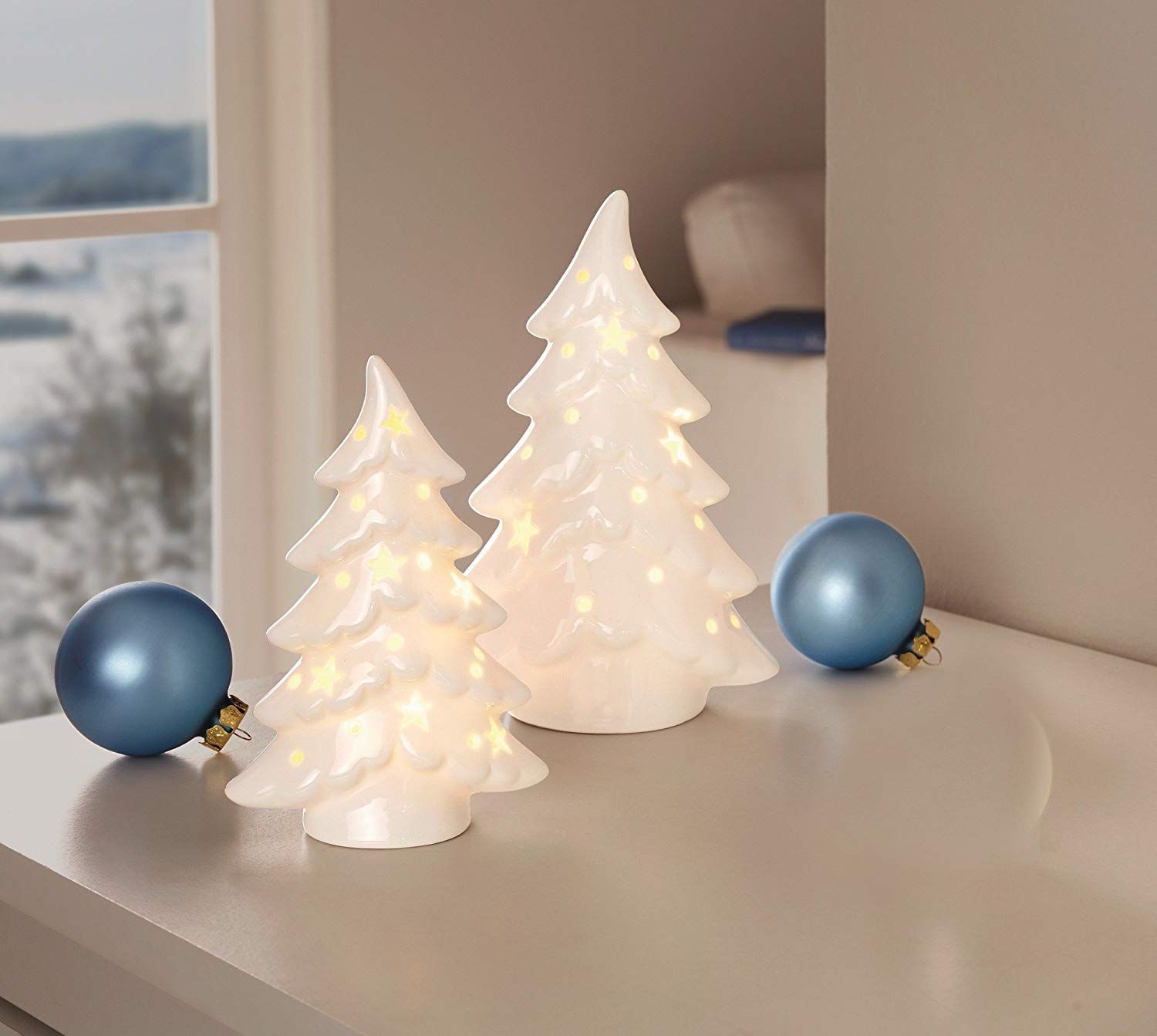 Lit White Ceramic Christmas Trees with Star Cutouts Lit White Ceramic Christmas Trees with Star Cutouts — White Christmas Tree Decor