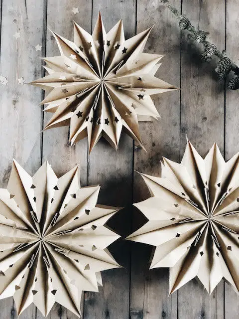 Large Folded Paper Star Ornaments on Rustic Wood — DIY Christmas Ornaments