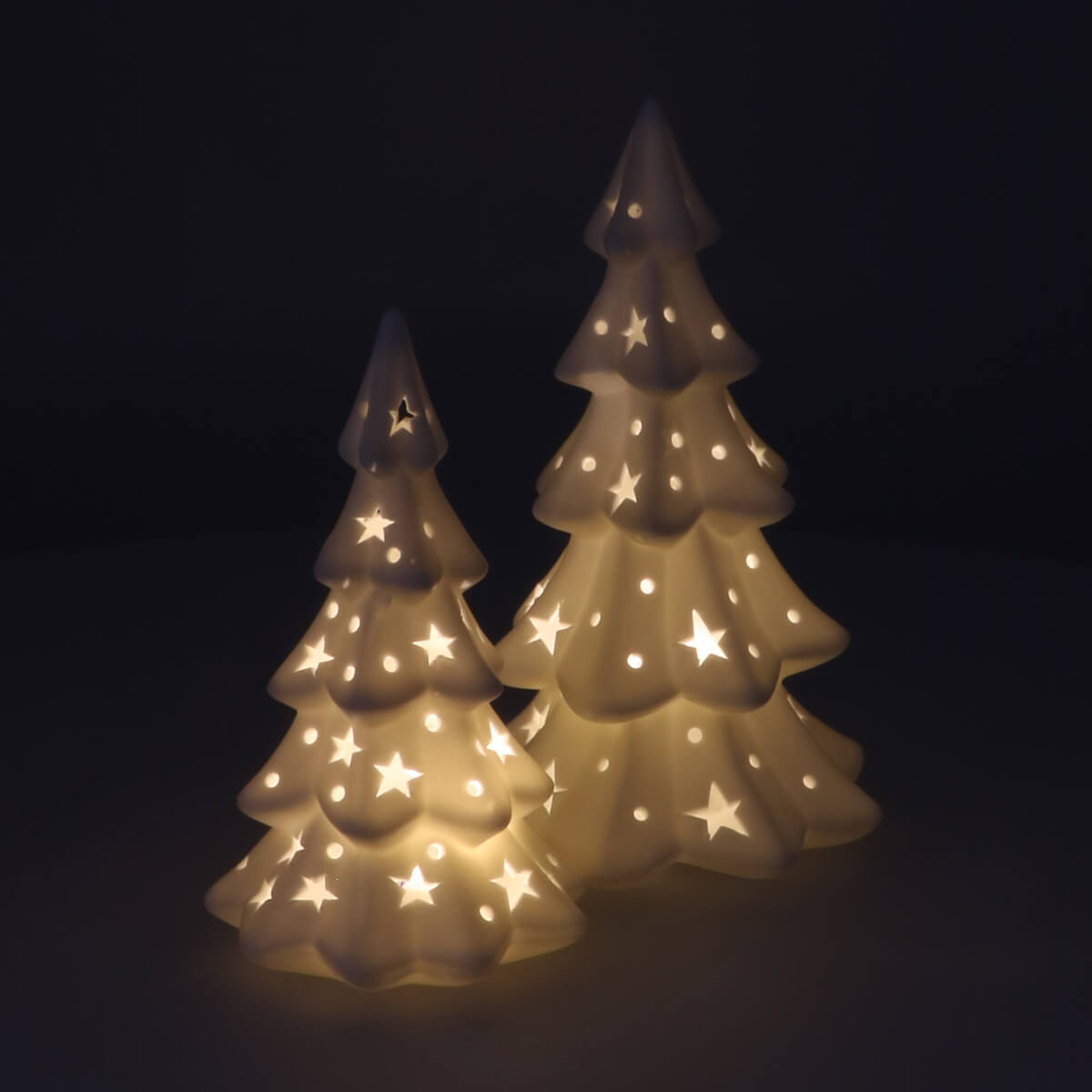 Illuminated Porcelain Trees Glow on Tabletop Illuminated Porcelain Trees Glow on Tabletop — Christmas Tree Lights