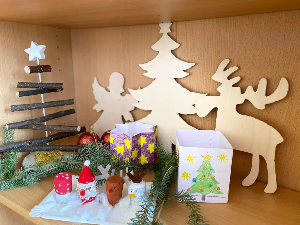 Variety of Handmade Christmas Figures on a Shelf Variety of Handmade Christmas Figures on a Shelf — Christmas Classroom Decor
