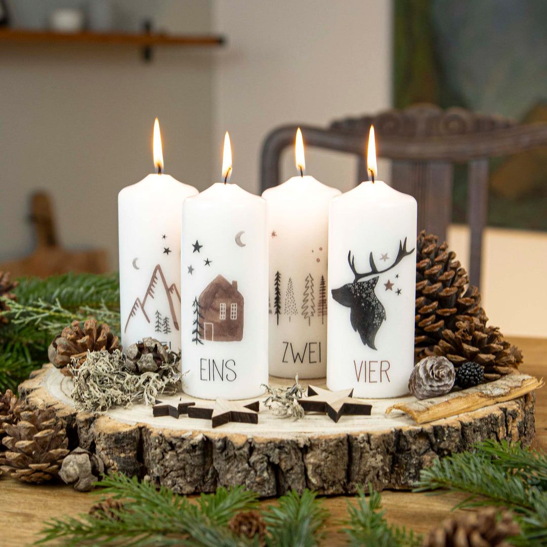 Graphic Pillar Candles with Christmas Motifs — Christmas Window Candles