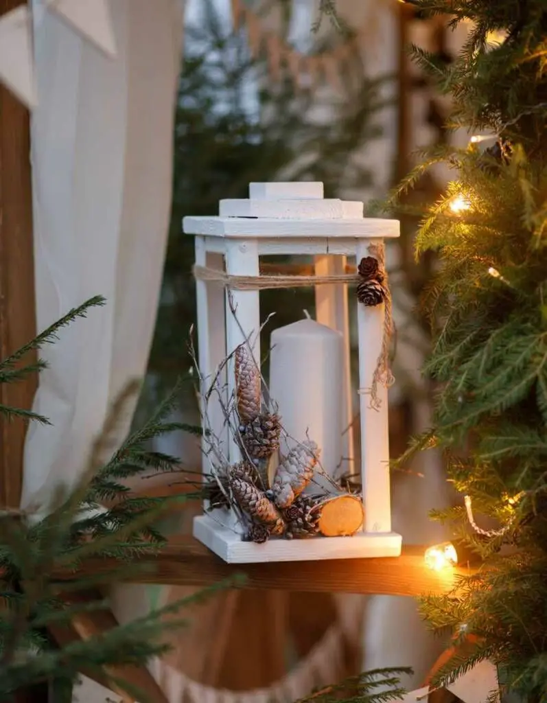 Rustic Shelf Display with a White Wooden Lantern Rustic Shelf Display with a White Wooden Lantern — Christmas Light Display Ideas