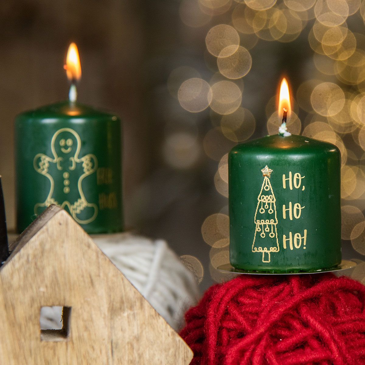 Whimsical Green Candles with Gingerbread Man and Tree Motifs — Christmas Candle Decor
