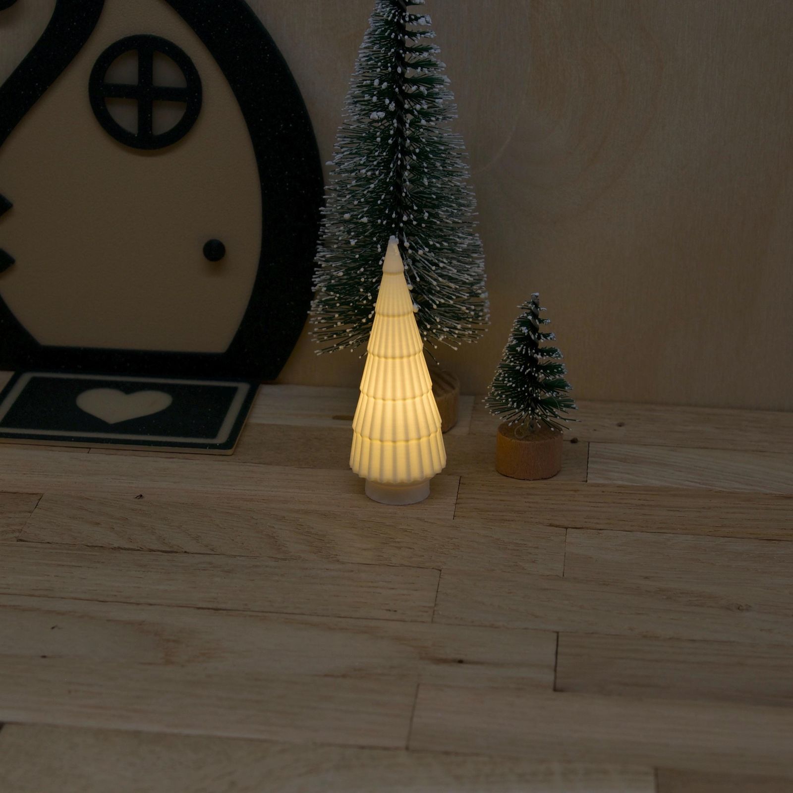 Glowing White Ceramic Tree in a Miniature Scene Glowing White Ceramic Tree in a Miniature Scene — Small Christmas Tree Decor