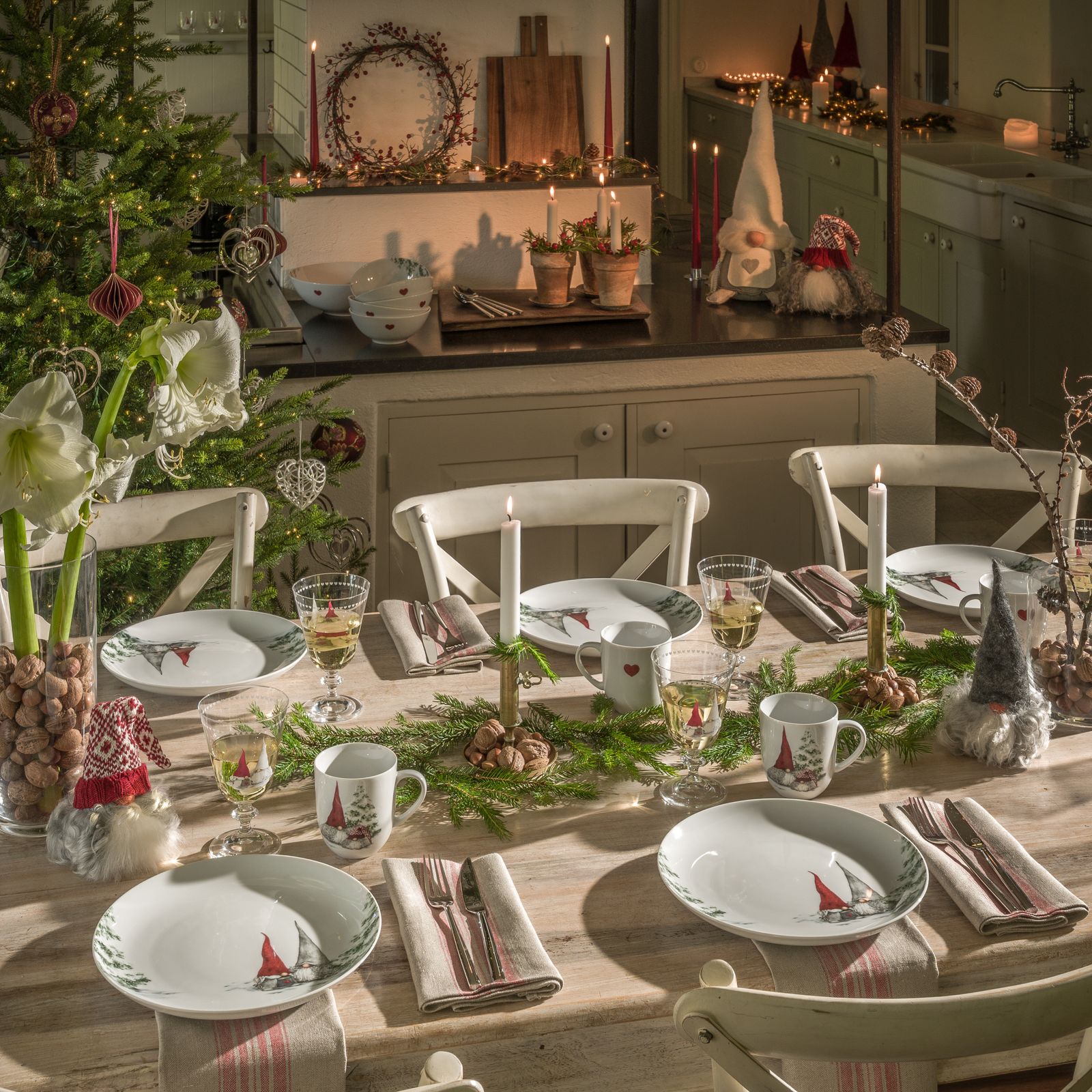 Traditional Christmas Table with Gnome Figures and Pine Garland — Christmas Dining Room Decor