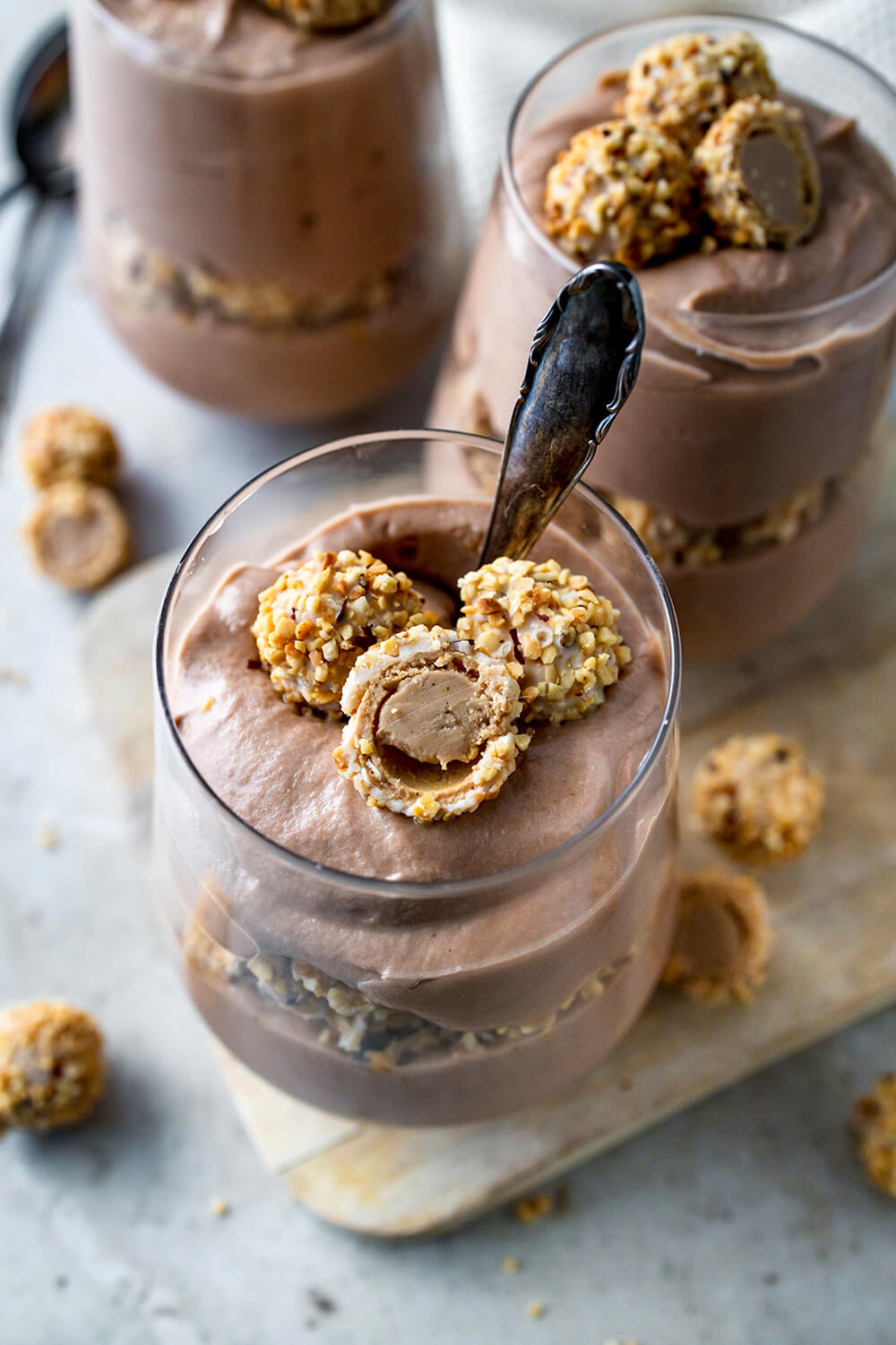 Decadent Chocolate Mousse Desserts with Hazelnut Candy Topping — New Years Eve Dessert Table