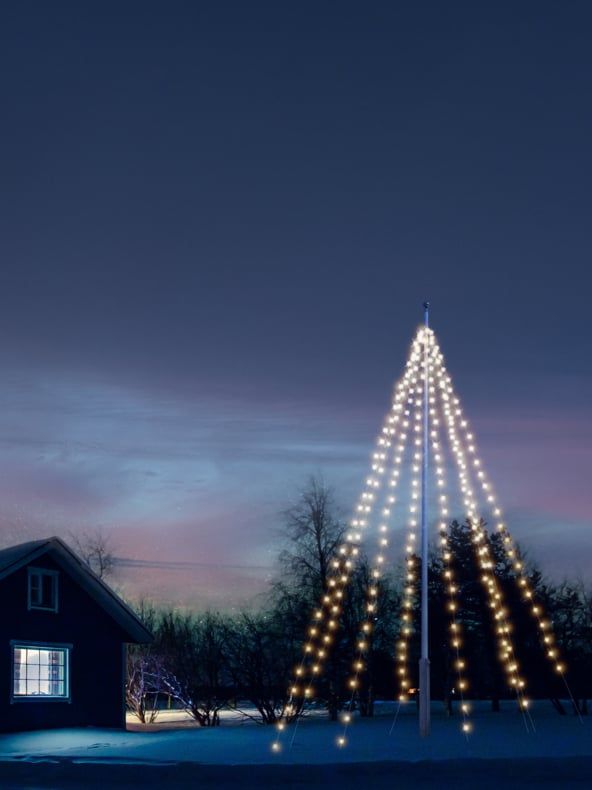 Large Tree-Shaped Light Installation on a Pole — Outdoor Christmas Lights