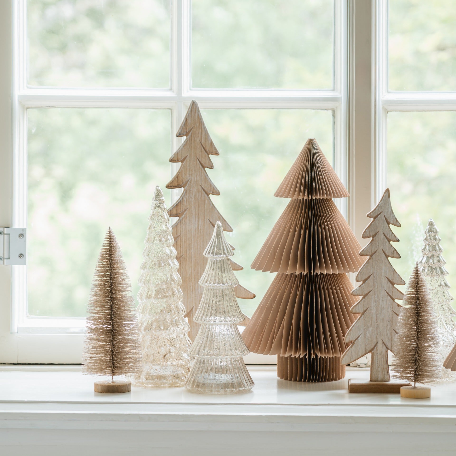 Eclectic Mix of Materials on a Windowsill Display — Tabletop Christmas Tree Decor