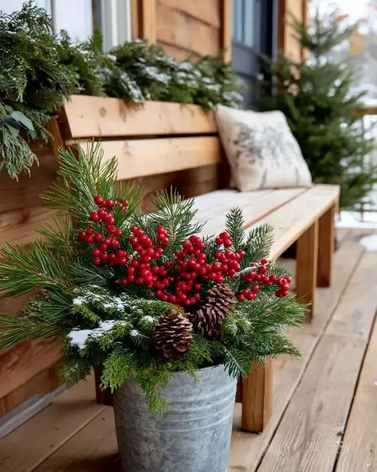 Galvanized Bucket Planter with Frosted Greenery Galvanized Bucket Planter with Frosted Greenery — Christmas Porch Planters