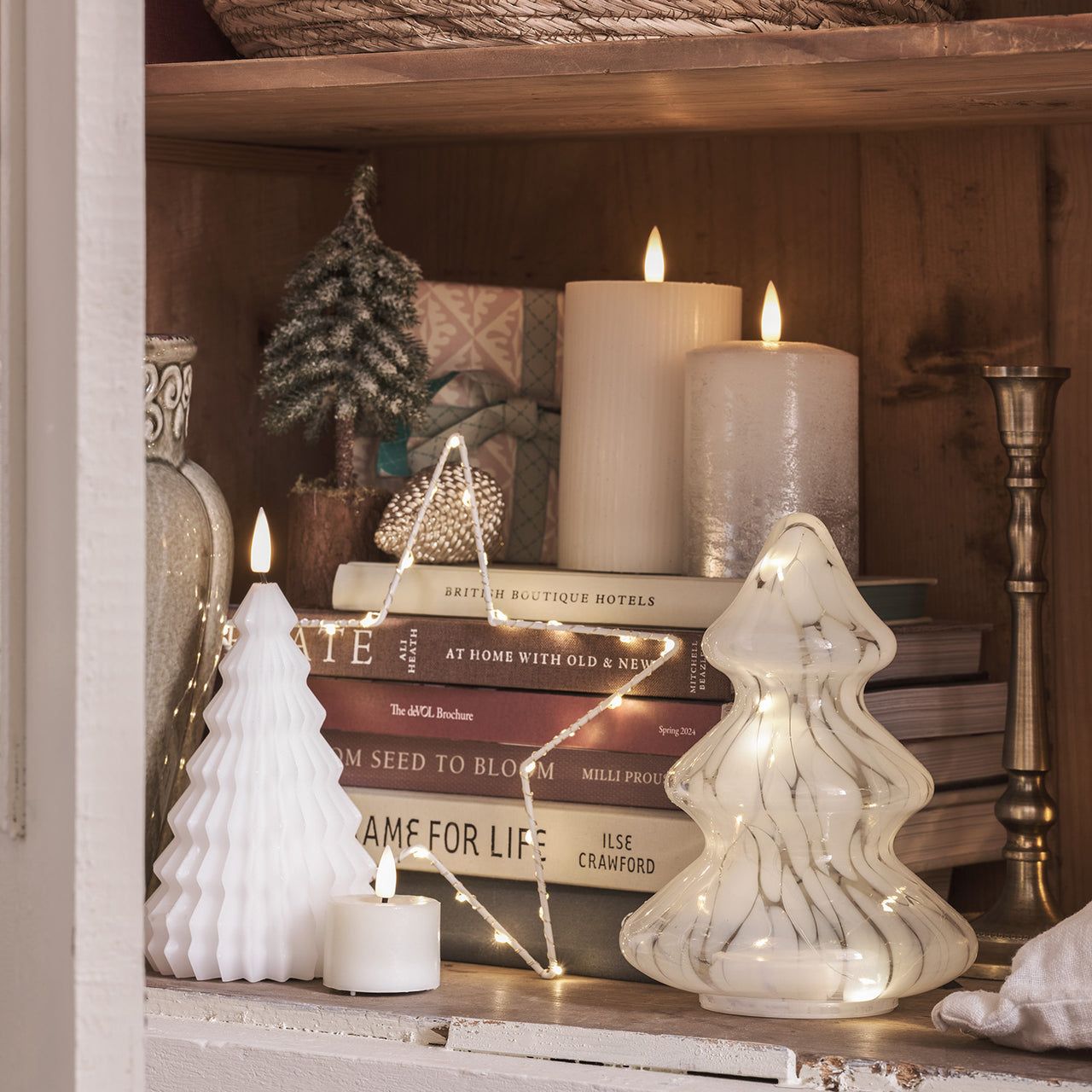 Illuminated Glass and Ceramic Decorative Trees on a Shelf Illuminated Glass and Ceramic Decorative Trees on a Shelf — White Christmas Tree Decor