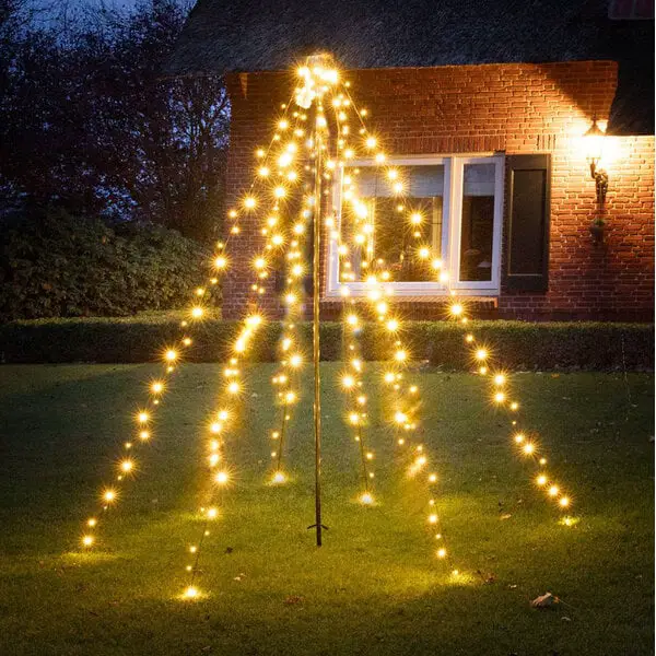 Cascading String Lights Form a Dramatic Tree Shape Cascading String Lights Form a Dramatic Tree Shape — Christmas Tree Lights
