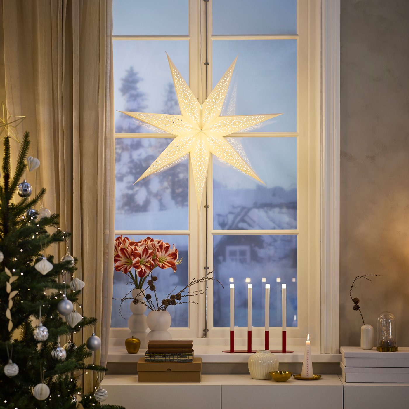 Cozy Evening Window with a Glowing White Paper Star Lantern — Christmas Living Room Decor
