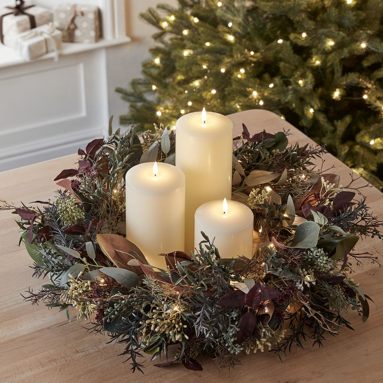 Rustic Candle Wreath with Mixed Greenery and Subtle Fairy Lights — Christmas Candle Decor