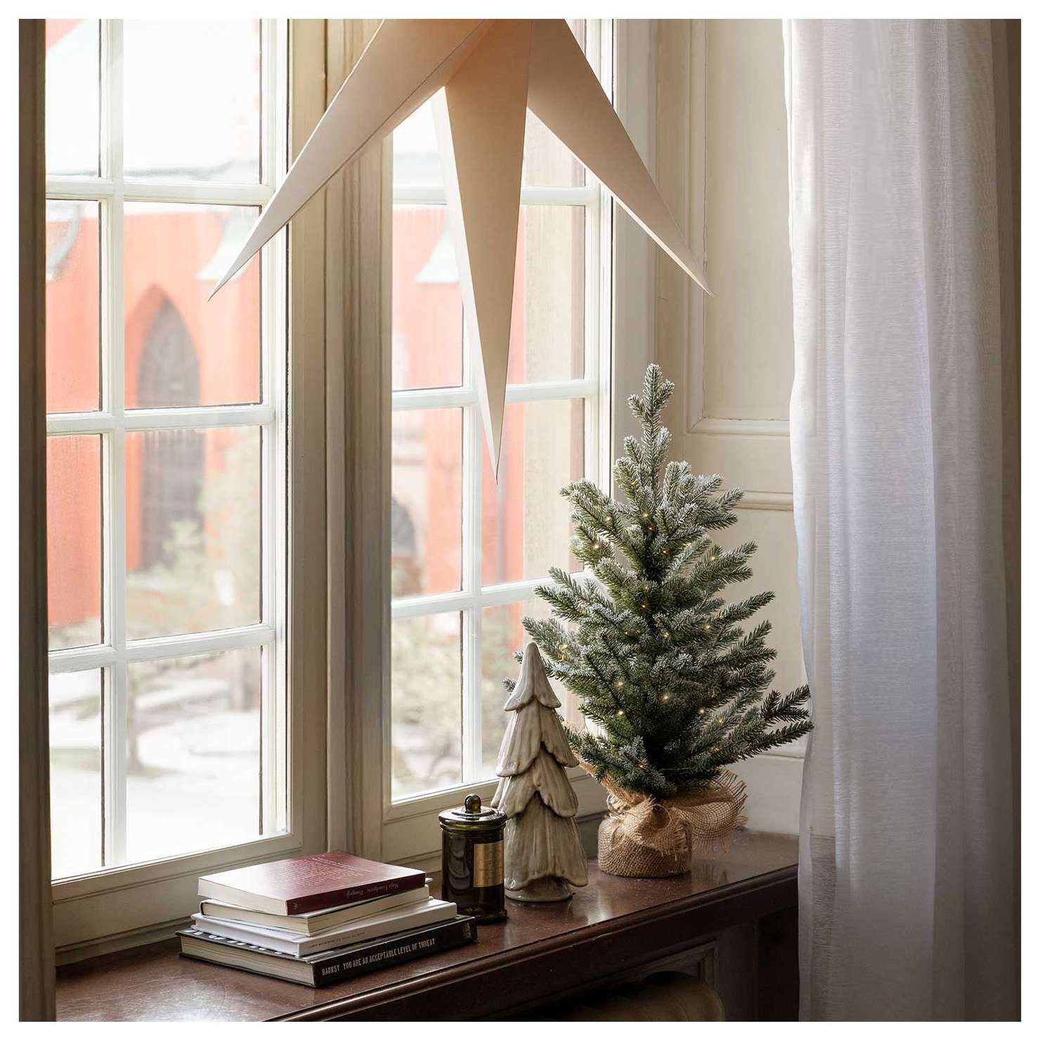 Frosted Mini Tree on a Windowsill Frosted Mini Tree on a Windowsill — Small Christmas Tree Decor