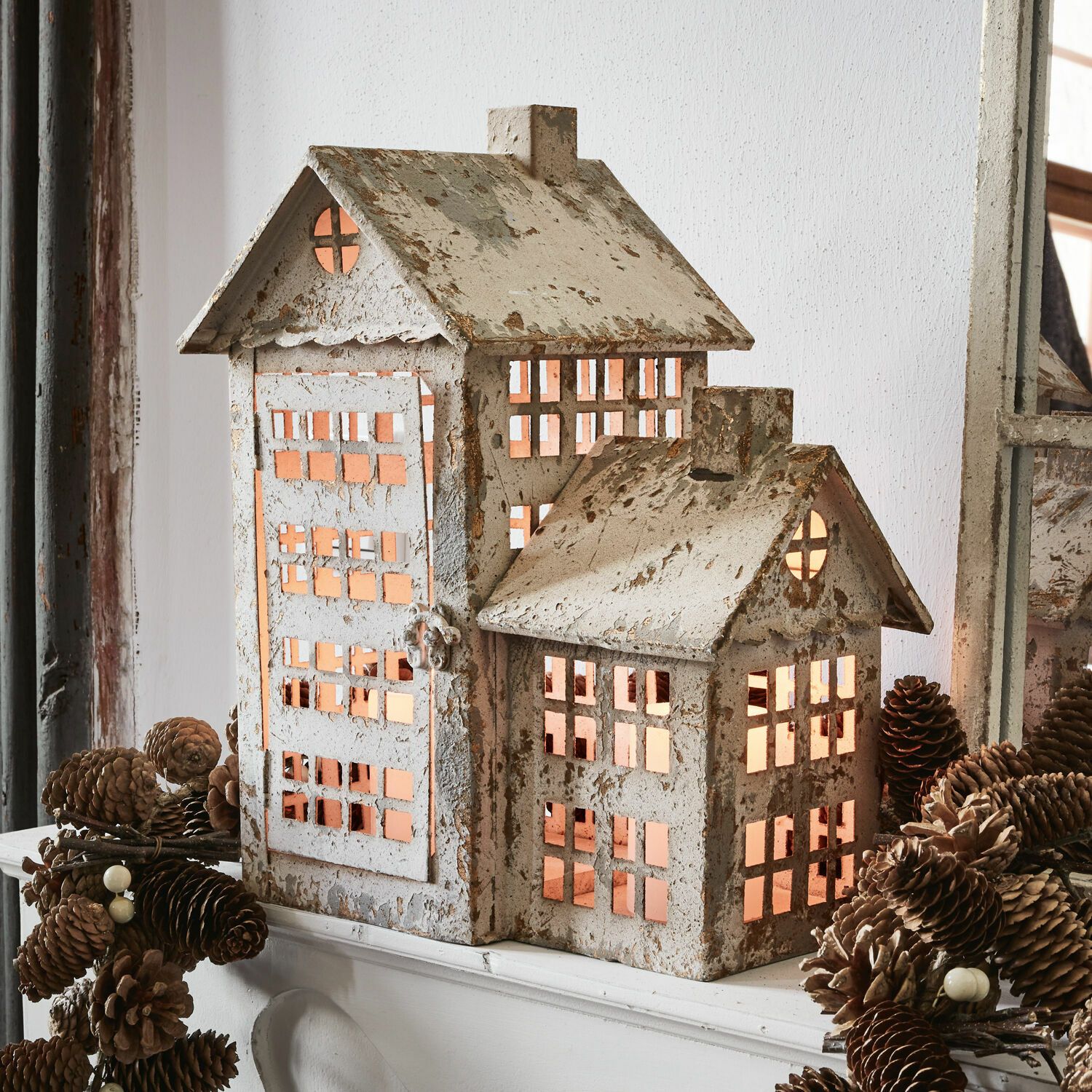 Vintage Distressed House-Shaped Lanterns on a Mantelpiece — Christmas Lantern Lights