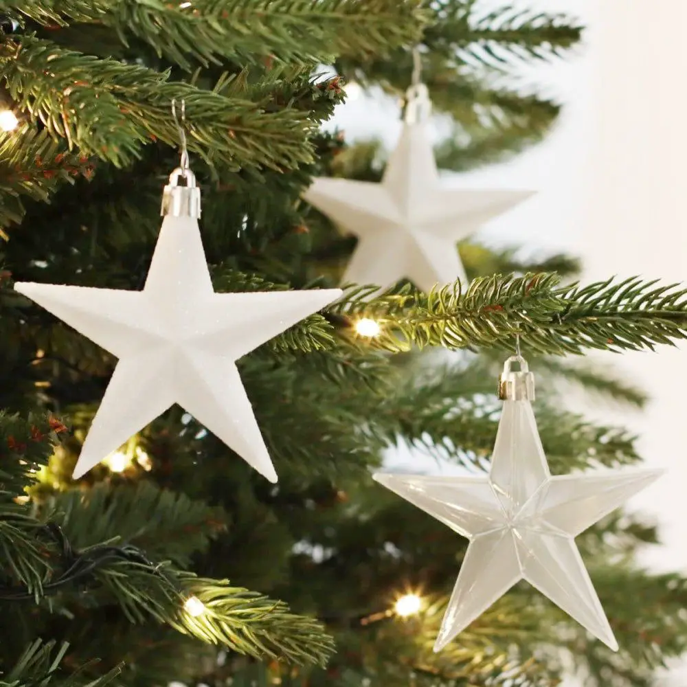 White Star Ornaments Sparkle on a Christmas Tree White Star Ornaments Sparkle on a Christmas Tree — White Christmas Tree Decor