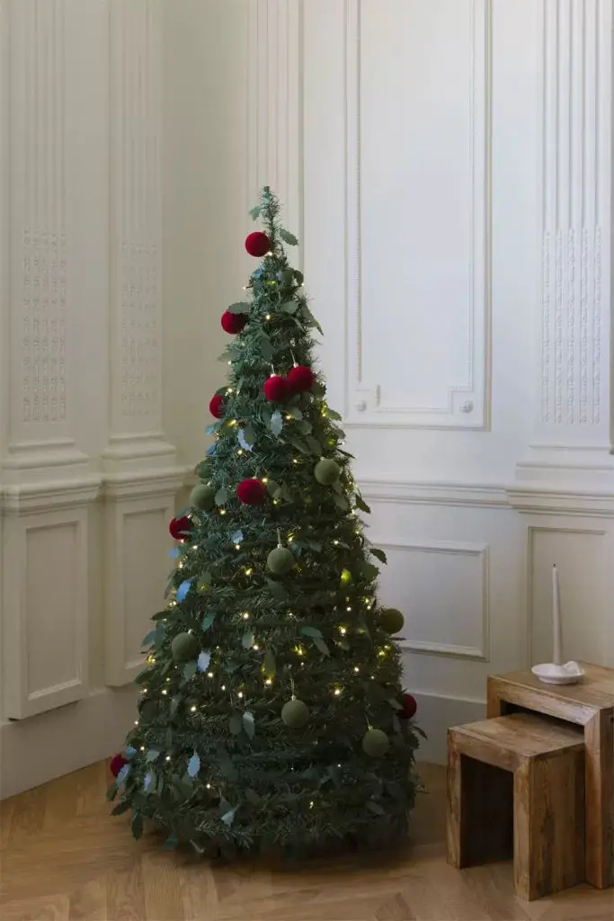 Minimalist Slim Christmas Tree in a Modern Corner Minimalist Slim Christmas Tree in a Modern Corner — Slim Christmas Tree Decor
