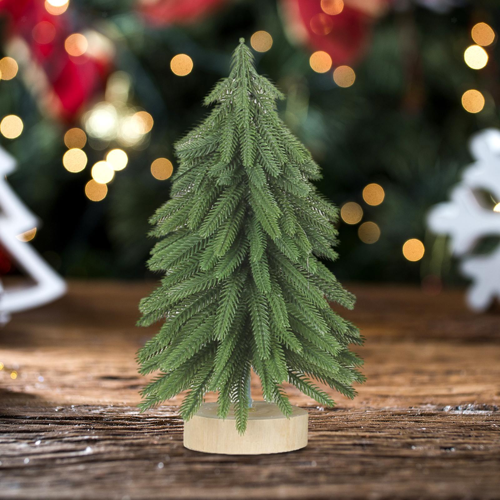 Miniature Green Christmas Tree with Wood Base and Bokeh Lights Miniature Green Christmas Tree with Wood Base and Bokeh Lights — Rustic Christmas Tree
