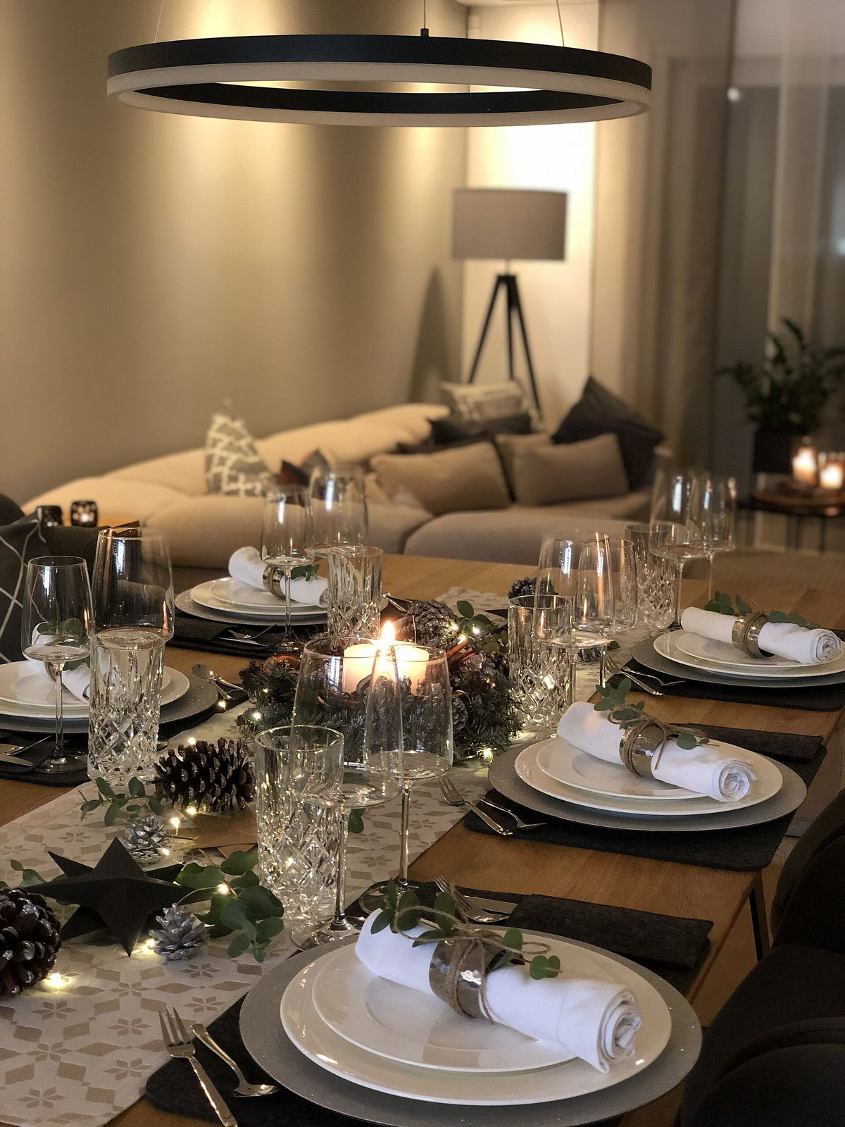 Wide Room Shot Modern Neutral Dining Table with Greenery and Gold Accents — Christmas Dining Room Decor