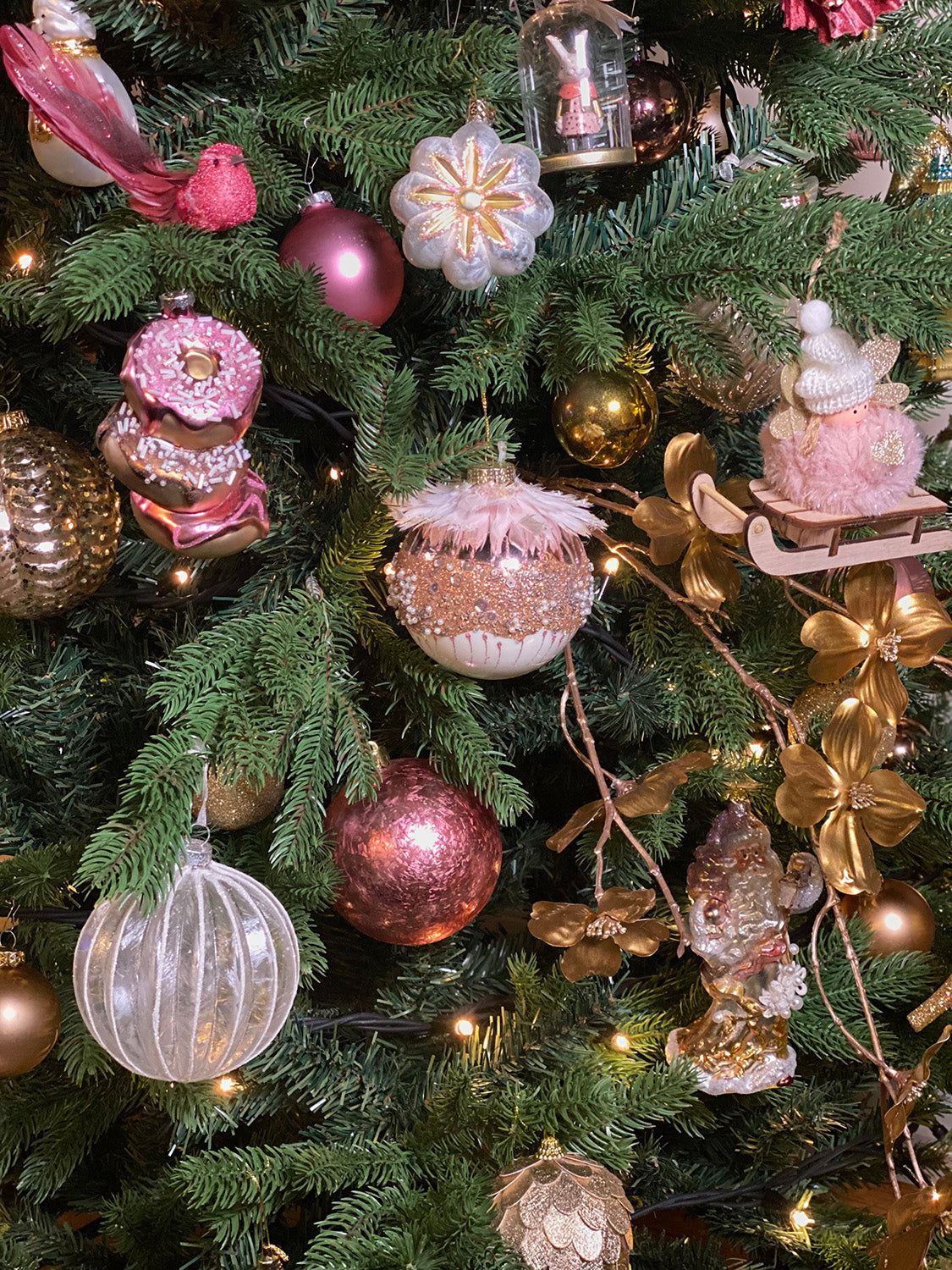 Whimsical Pink Donut and Gingerbread Ornaments on a Christmas Tree — Pink and Gold Christmas Tree
