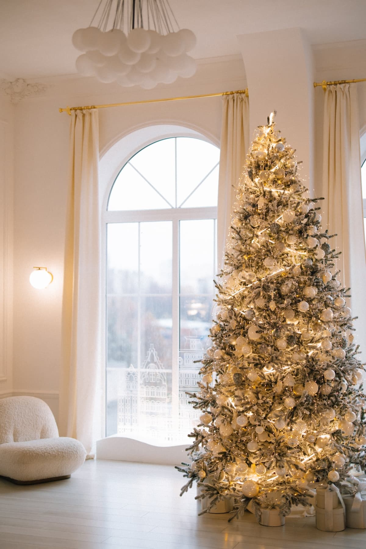 Elegant Modern Christmas Tree by a Large Window — Elegant Christmas Decor