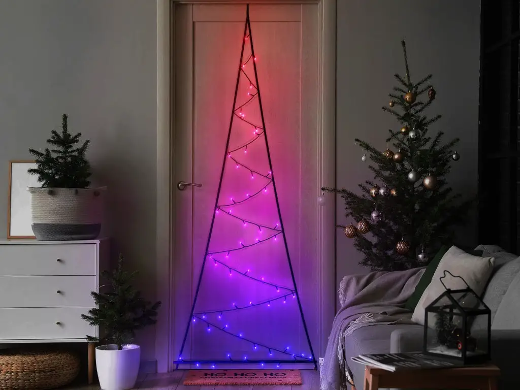 Modern Doorway Outlined in Pink and Purple Lights Modern Doorway Outlined in Pink and Purple Lights — Christmas Door Frame Lights