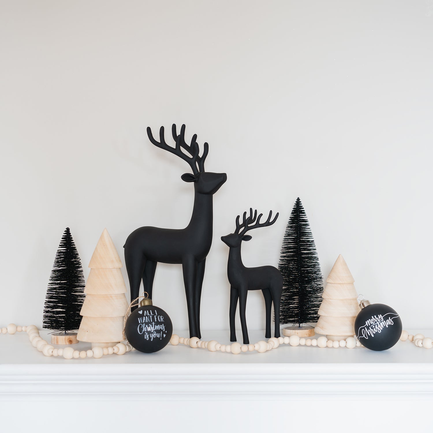 Modern Vignette with Black Reindeer and Trees — Tabletop Christmas Tree Decor