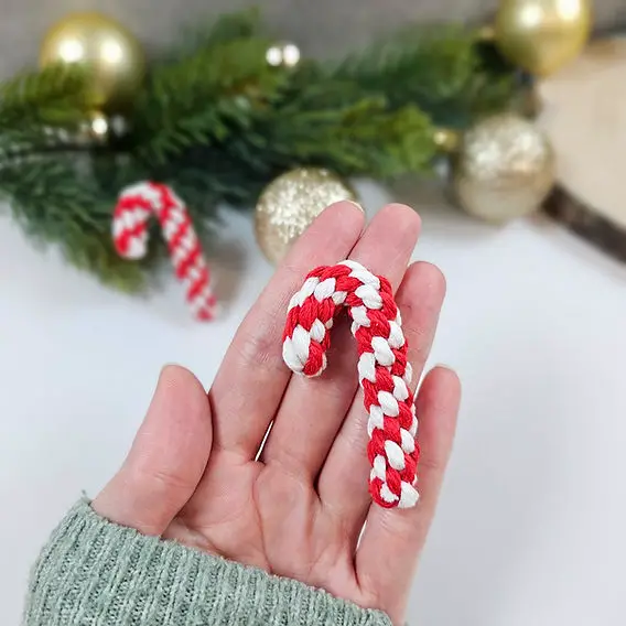 Boho Macrame Candy Canes Held by Hand — Candy Cane Christmas Tree