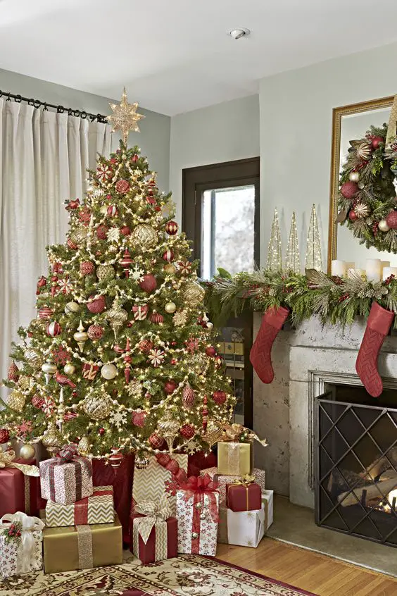 Grand Christmas Tree Paired with a Stone Fireplace — Traditional Christmas Decor