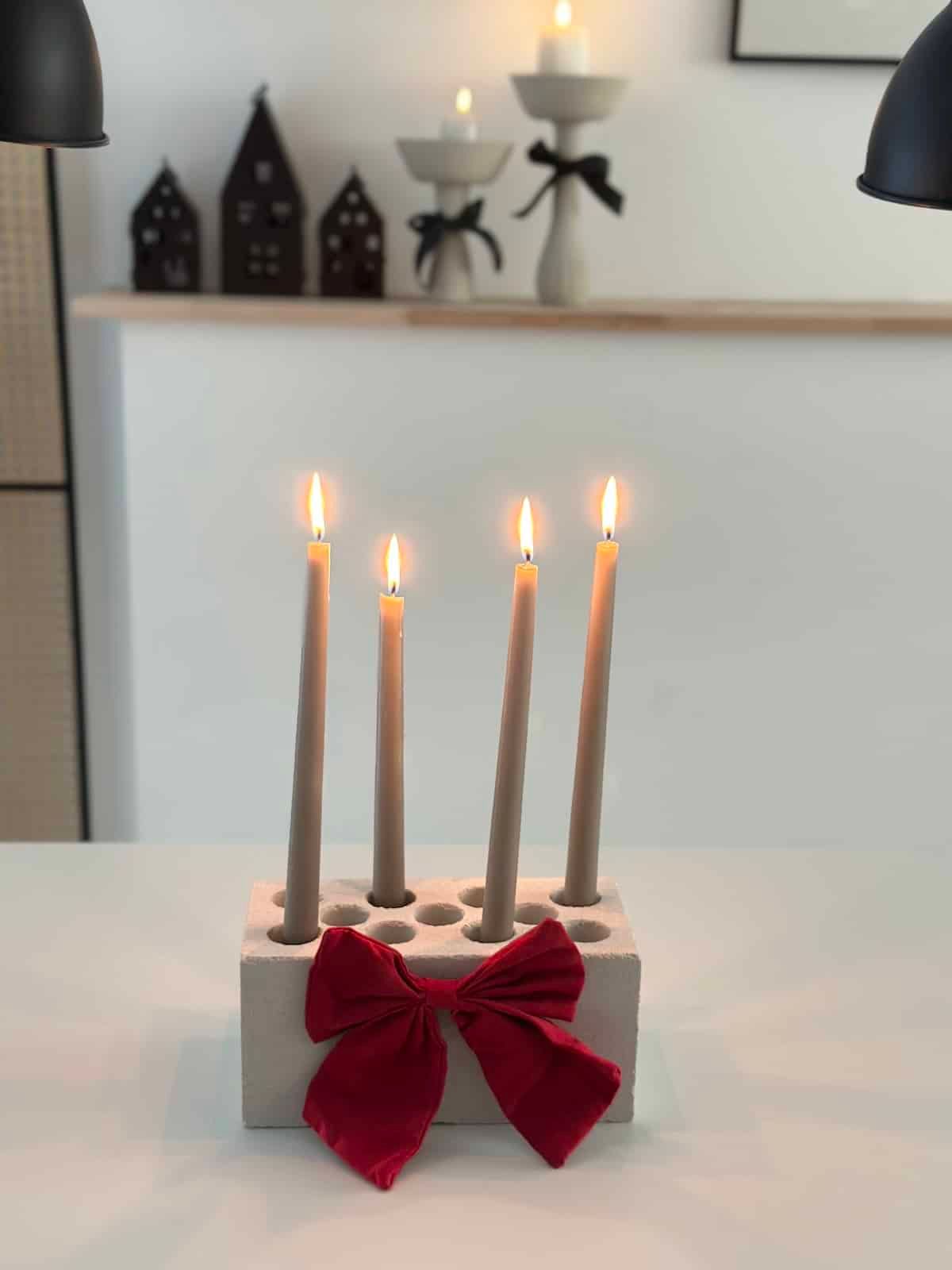Minimalist Concrete Holder with Red Bow Minimalist Concrete Holder with Red Bow — Advent Wreath