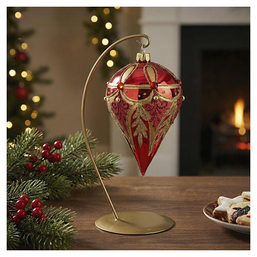 Ornate Red Glass Ornament with Gold Detailing on a Brass Stand Ornate Red Glass Ornament with Gold Detailing on a Brass Stand — Red and Gold Christmas Tree