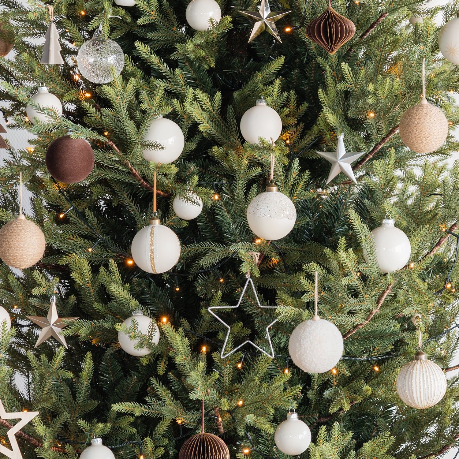 Scandinavian Christmas Tree with White and Beige Ornaments Scandinavian Christmas Tree with White and Beige Ornaments