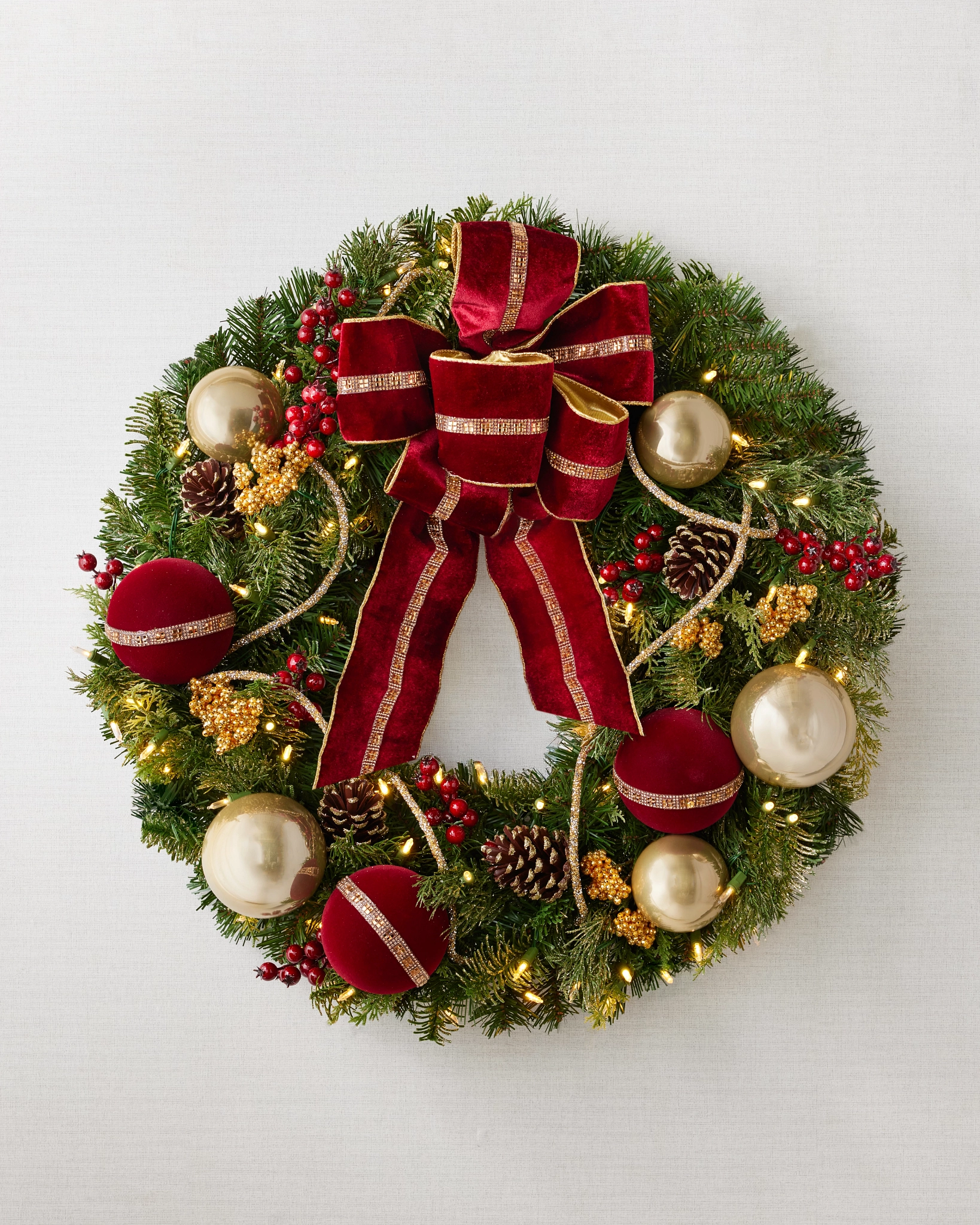 Elaborate Christmas Wreath with Gold Ornaments and Red Bow Elaborate Christmas Wreath with Gold Ornaments and Red Bow — Ornament Wreath